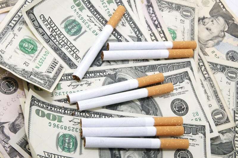 42.depositphotos_10758888-stock-photo-cigarettes-and-money