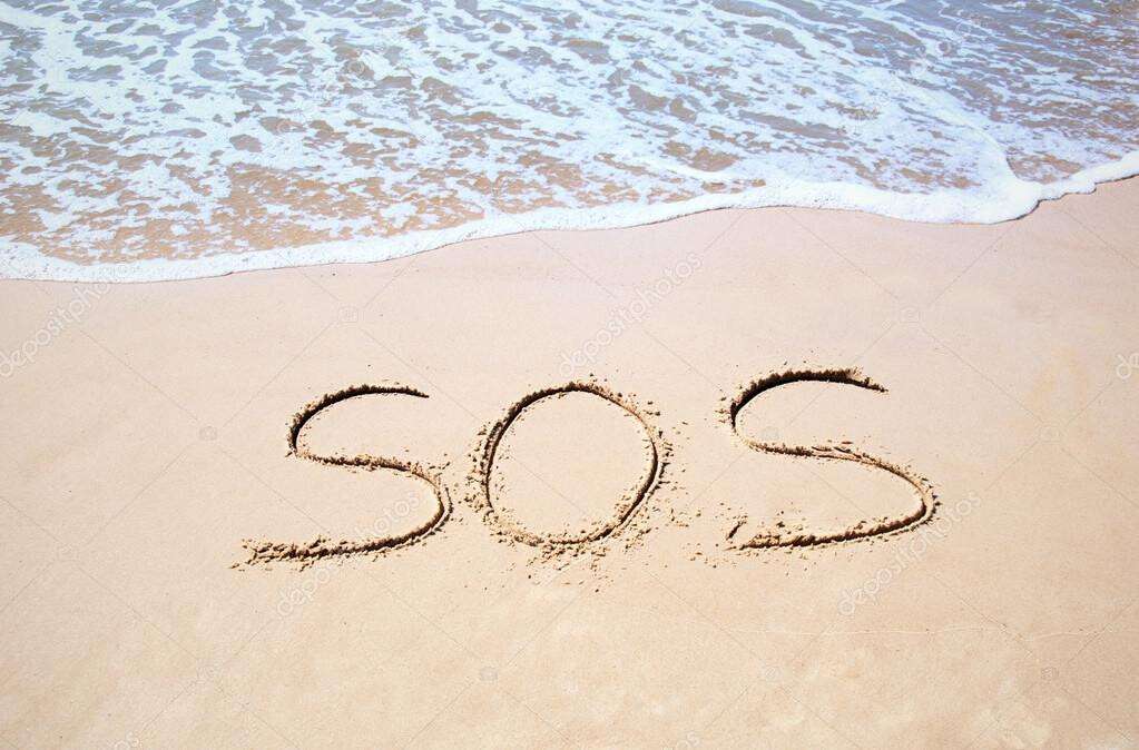 depositphotos_3957519-stock-photo-inscription-sos-on-sand-and.jpg