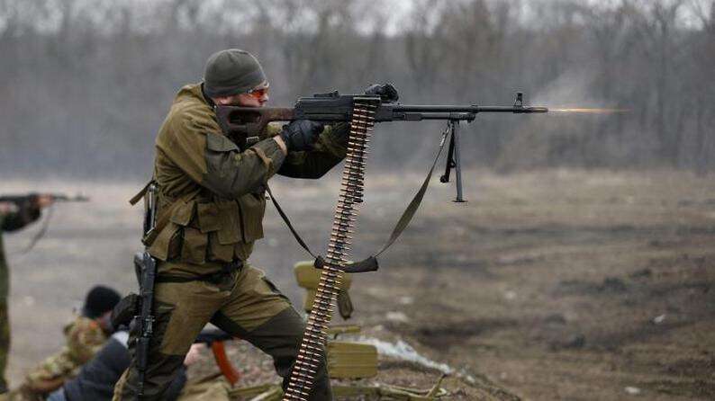 a-volunteer-of-the-separatist-self-proclaimed-donetsk-people-s-republican-guard-fires-a-weapon-during-shooting-training-in-donetsk.jpg