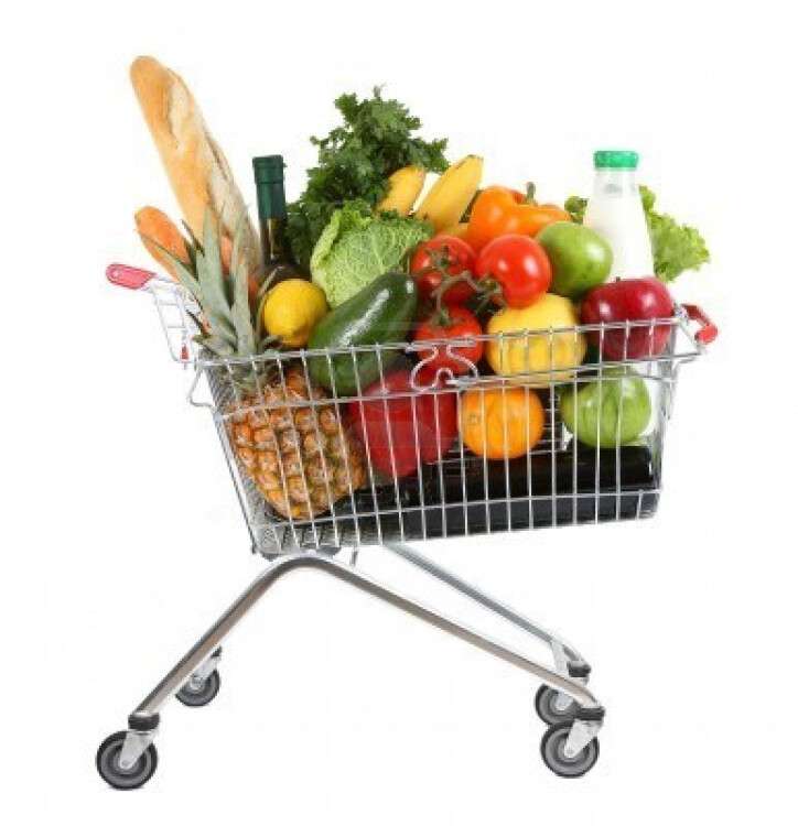 6043288-metal-shopping-trolley-filled-with-products-isolated-on-white.jpg