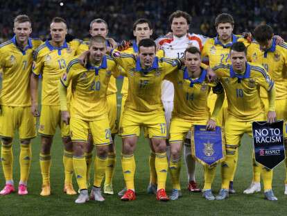 Ukraine's players pose for a picture before their Euro 2016 group C qualifying soccer match against Spain at the Olympic stadium in Kiev