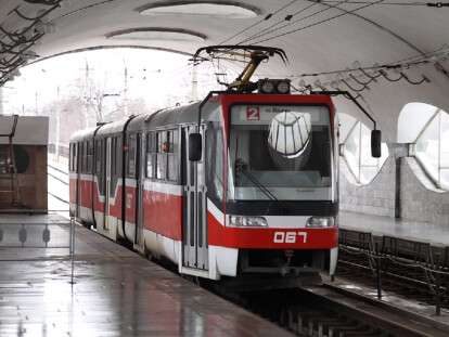 тра