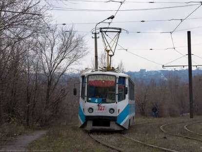 тра