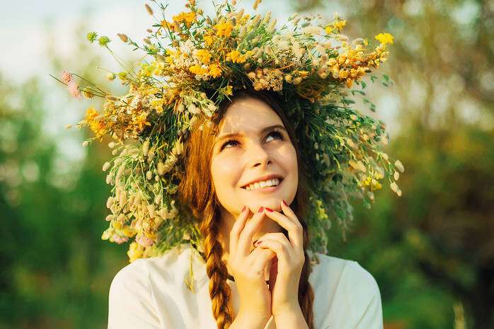 Young pagan Slavic girl conduct ceremony on Midsummer. Earth day