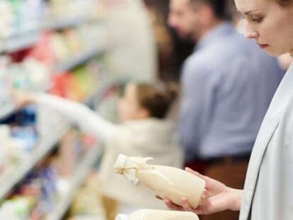 Woman Choosing Good Milk