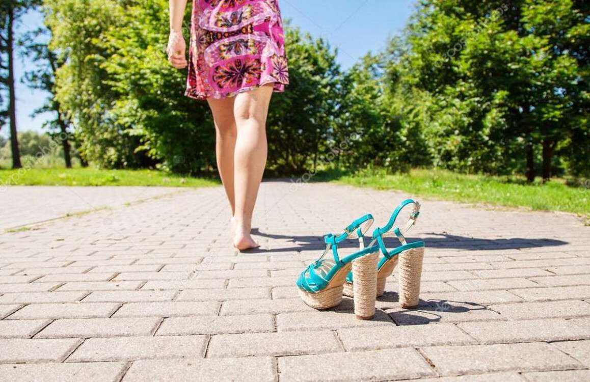 depositphotos_117583492-stock-photo-shoes-standing-on-sidewalk-and