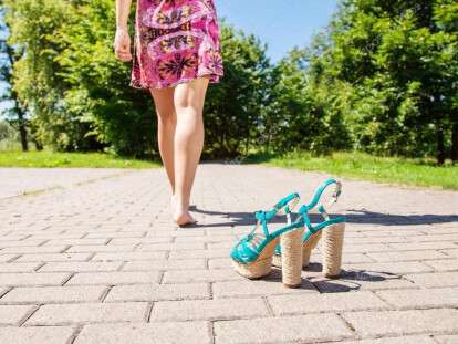 depositphotos_117583492-stock-photo-shoes-standing-on-sidewalk-and