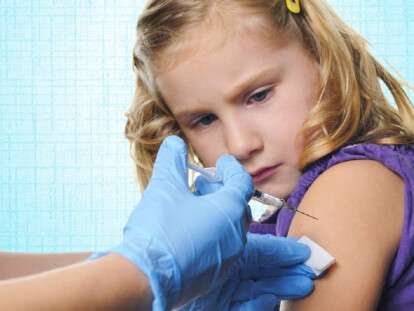 Child vaccinations on blue background.