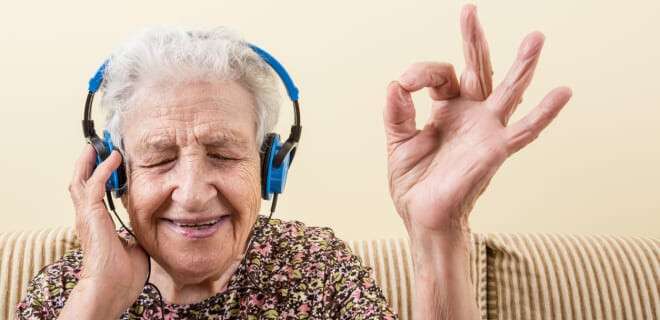 senior woman listening music