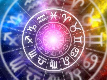 Zodiac signs inside of horoscope circle on universe background