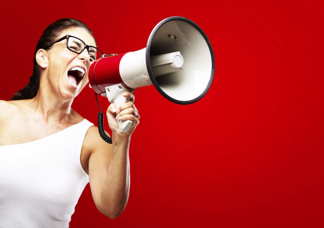 woman shouting using megaphone