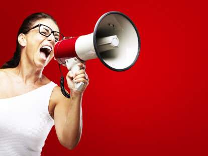 woman shouting using megaphone