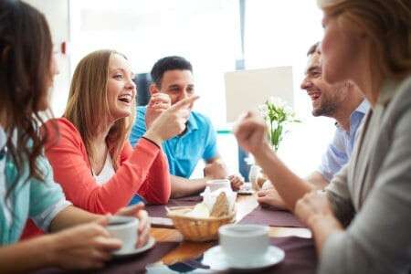 depositphotos_38917975-stock-photo-friends-chatting-in-cafe