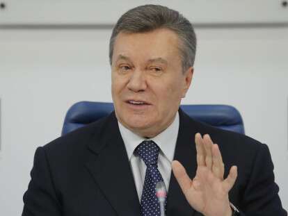 Former Ukrainian President Viktor Yanukovich speaks during a news conference in Moscow