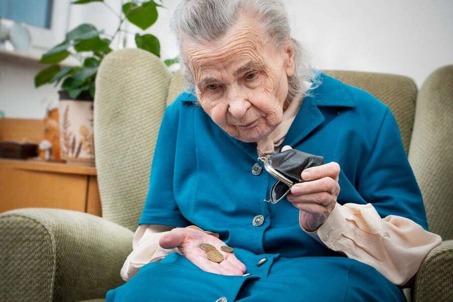 Senior woman counting money