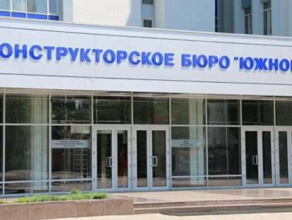 кон