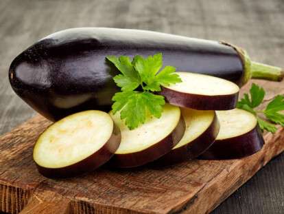 sliced eggplant on cutting board