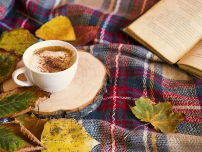 Autumn coffee cup with cozy blanket, fall deco warm home weekend