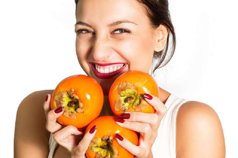 Woman who very fond persimmon!